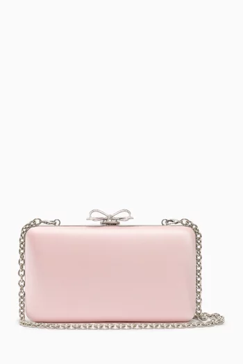 كلاتش مزين بعقدة ستان