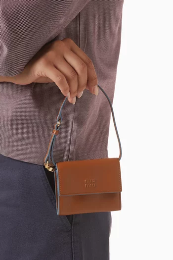 Maison Exclusive Miu Miu