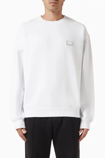 سويت شيرت بحلية شعار الماركة قطن