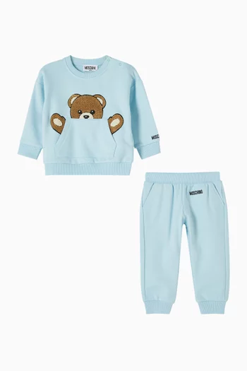 BG SWEATSHIRT TEDDY BEAR PEEKING OUT OF THE KANGAROO POCKET, PAIRED WITH MATCHING JOGGERS.:Light/Pastel Blue:12-18M|219854876