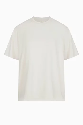 تي شيرت بقصة فضفاضة وتقنية DRI-FIT™‏ قماش مسامي