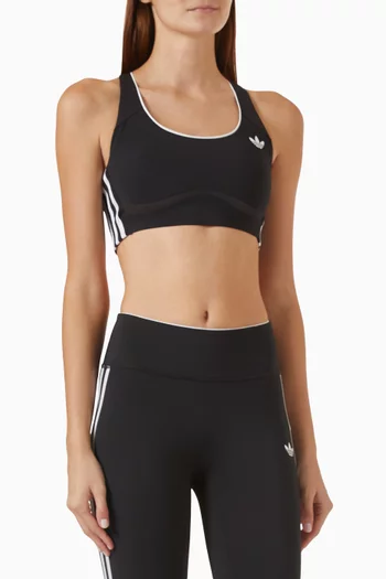 حمالة صدر بدعم متوسط ضمن تشكيلة الملابس الرياضية لأديداس اوريجينالز