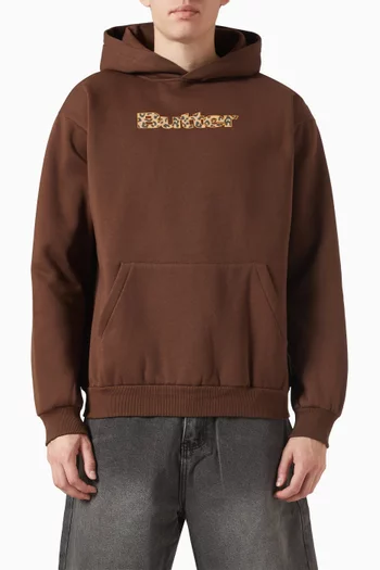 كنزة بغطاء رأس بشعار الماركة بنقشة جلد الفهد