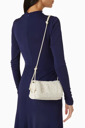 Notturno Pouch in Intrecciato Calfskin & Shearling Leather