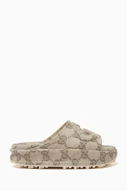Buy Gucci Neutral Miami Interlocking G Slide Sandals in Rubber for