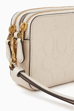 Buy Coach White Kira Crossbody Bag in Signature Leather for Women