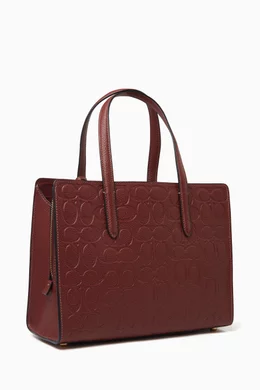 Coach charlie carryall 28 oxblood hotsell