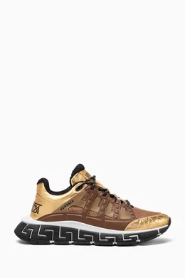 Buy Versace Gold La Vacanza Trigreca Sneakers in Metallic