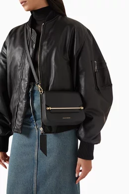 Buy Strathberry Black Ace Mini Crossbody Bag in Leather for Women