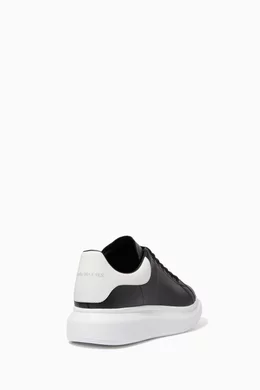 Alexander mcqueen trainers mens black and white best sale