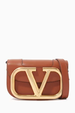 Buy Valentino Garavani Brown Valentino Garavani Supervee Small Crossbody Bag in Calfskin For Women Online Ounass Saudi