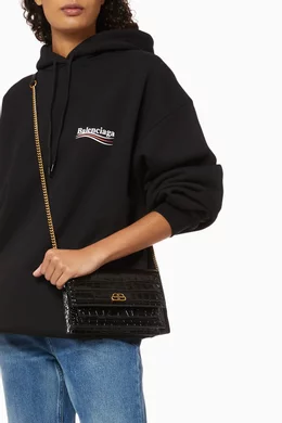 Buy Balenciaga Black Sharp Clutch on Chain in Shiny Crocodile Embossed Calfskin For Women Online Ounass Saudi