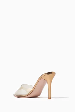 Buy Gianvito Rossi Gold Elle 85 Mules in Metallic Leather