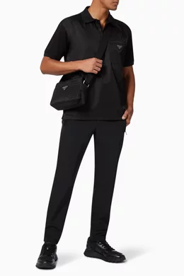 トップス prada black triangle logo polo shirt Prada Triangle-Logo Zip Polo Shirt In Black | Editorialist