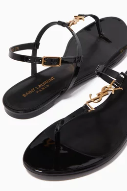 【Saint Laurent】Patent Leather Cassandra Flat Sandals Black Cassandra sandals in patent leather | Saint Laurent | YSL US