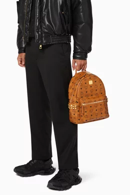 Buy MCM Brown Stark Side Studs Backpack in Visetos, 32cm  display picture 1