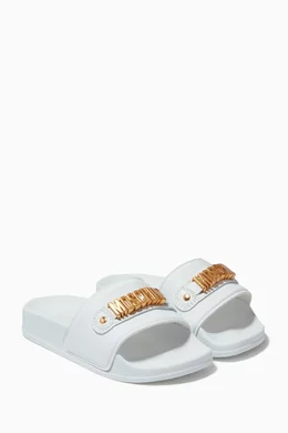 Buy Moschino White Embellished Logo Slides in Rubber For Kids Online Ounass Saudi