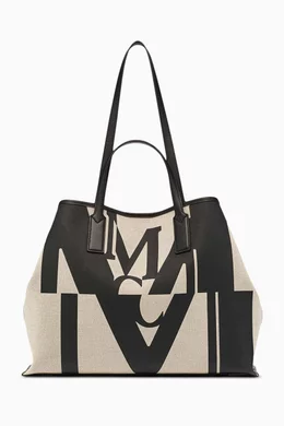 Buy MCM Black Aren Medium Shopper in Logo Glitch Canvas For Women Online Ounass Saudi