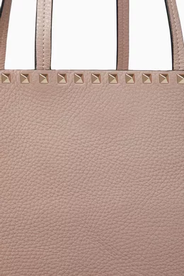 Rockstud grainy calfskin vertical bag deals