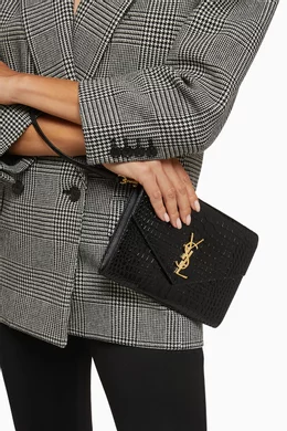 Buy SAINT LAURENT Black Cassandre Clutch in Croc embossed Leather For Women Online Ounass Saudi