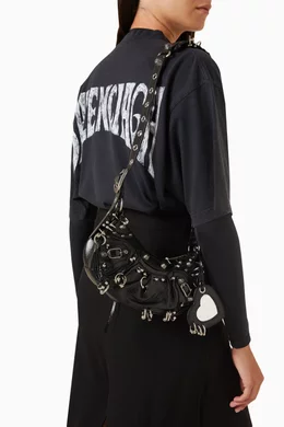 Buy Balenciaga Black Le Cagole XS Shoulder Bag with Piercings in