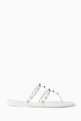 Valentino garavani pvc rockstud flat sandals 2025