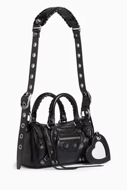 Buy Balenciaga Black Mini Le Cagole Duffle Bag in Arena