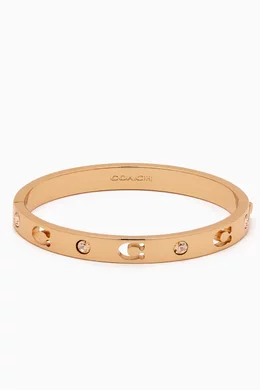 Buy Coach Gold Signature Stone Hinged Bangle in Metal For