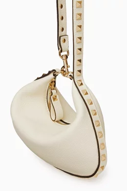 Buy Valentino Garavani Neutral Valentino Garavani Mini Hobo Rockstud Shoulder Bag in Leather For Women Online Ounass Saudi