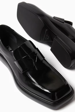 Buy Prada Black Brushed Penny Loafers in Leather For Women Online