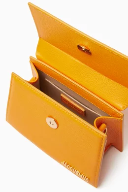 Buy Jacquemus Orange Le Chiquito Moyen Boucle Bag in Leather For