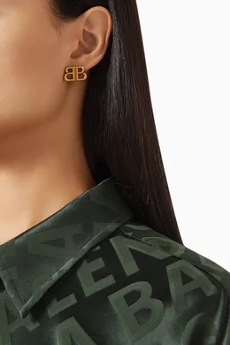 Buy Balenciaga Gold Monaco Stud XS Earrings in Antique Zamak For