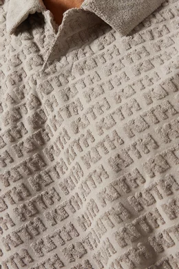 Buy Kith Neutral Italic Monogram Leo Polo Shirt in Towel Terry For