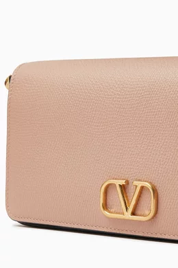 Buy Valentino Garavani Pink Valentino Garavani Wallet on Chain in Grained Leather For Women Online Ounass Saudi