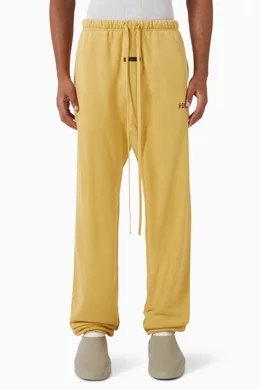 Buy Fear of God Essentials Yellow Logo Sweatpants in Core Fleece For Men Online Ounass Saudi