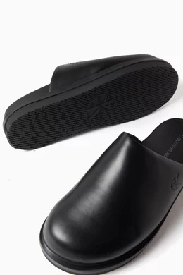 Buy Calvin Klein Black Logo Clog Slippers in Leather For Men Online Ounass Saudi