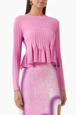Pink peplum sweater deals