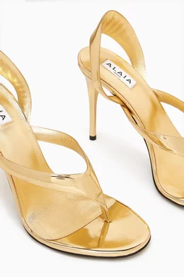 Buy Alaïa Gold Infradito 90 Sandals in Metallic Leather For
