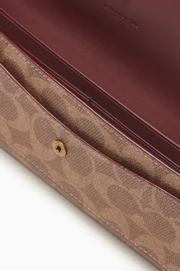 Buy Coach Brown Mila Long Flap Wallet in Signature Canvas For 