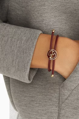 Gucci Burgundy Leather Strap Bracelet with Gold-Tone Interlocking G Vintage Gucci Red Leather Bangle Bracelet | 1970s GG Logo  main image 4