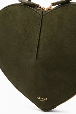 Buy Alaïa Green Le Coeur Crossbody Bag in Suede For Women