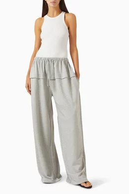 Buy Alaïa Grey Peplum Pants in Cotton Blend For Women Online
