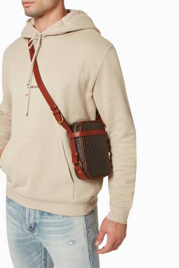 hover state of Le Monogramme Crossbody Pouch in Canvas & Smooth Leather