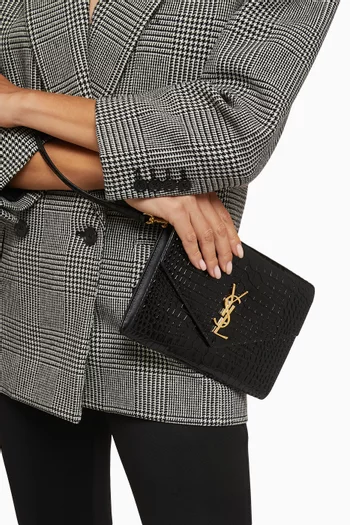 Cassandre Clutch in Croc-embossed Leather