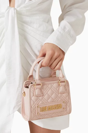 Mini Top Handle Bag in Quilted Faux Leather