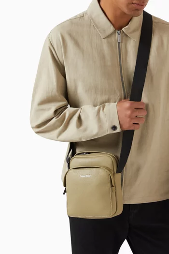 حقيبة ريبورتر جلد صناعي بشعار الماركة
