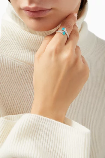 خاتم كليو بتصميم ملفوف مرصع بالماس والعقيق الأزرق ذهب أبيض عيار 18