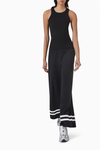 تي شيرت كيكي بلا أكمام بنسيج مضلع تينسيل مطاطي