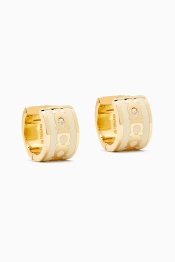 C Signature Huggie Earrings in Metal