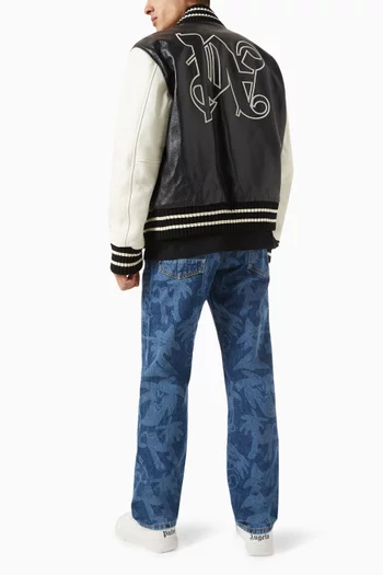 جاكيت بحروف الماركة بتصميم جامعي جلد